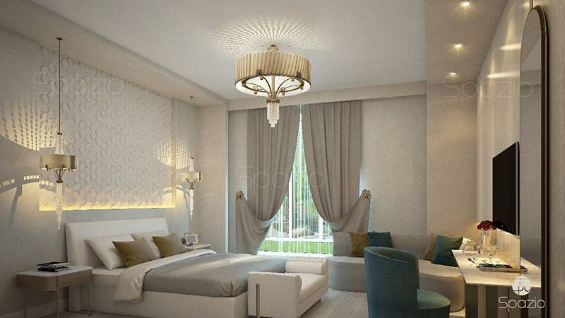 A cozy bedroom with a light decor on walls and ceiling